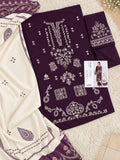 A flat-lay presentation of a three-piece Pakistani ethnic suit set, featuring a deep purple kurta with intricate silver embroidery, matching purple trousers, and a cream-colored dupatta with purple borders and motifs, displayed on a white faux fur rug.